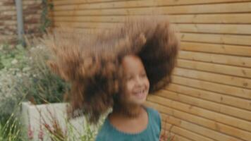 Girl jumping on trampoline smiling video