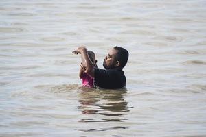 Sorong, Indonesia 2021- Father and child photo