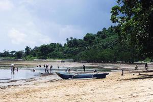 Sorong, Indonesia 2021- People on the beach photo