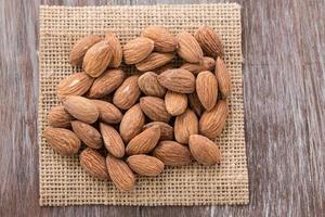 Heap of Almonds on Burlap photo