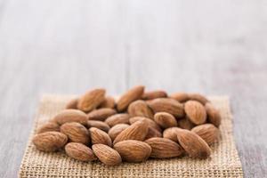 Close Up Almonds on Burlap photo