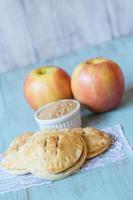 Red Apples and Hand Pies with Raw Sugar Vertical photo