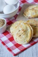 Autumn Apple Hand Pies with Raw Sugar and Eggs Vertical photo