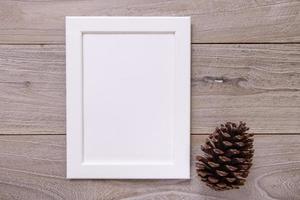 Nature garden retro wood vintage table white frame mock up pinecone photo