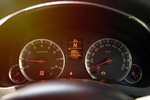 Speedometer Gauge on Dashboard in The Car photo