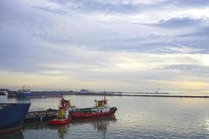 Seascape with a view of the ships at the port pier photo