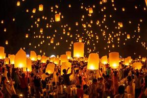 Floating lanterns on sky in Loy Krathong Festival photo