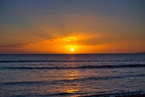 Sunset of Waikiki Beach Honolulu Hawaii photo