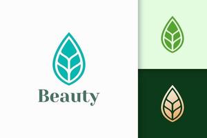 Logotipo de belleza o salud en forma de hoja abstracta y limpia. vector