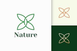 Logotipo de flores en estilo femenino y de lujo para la salud y la belleza. vector