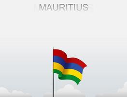 Flag of Mauritius flying under the white sky vector
