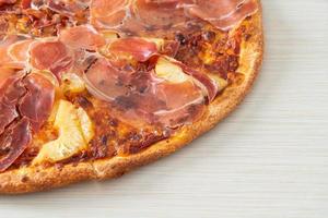 Pizza with prosciutto or parma ham pizza photo