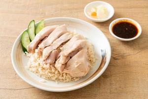 Hainanese chicken rice or rice steamed with chicken soup photo