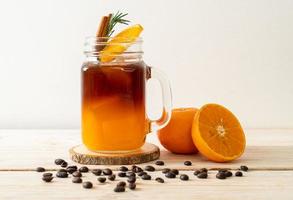 café negro con jugo de naranja y limón foto