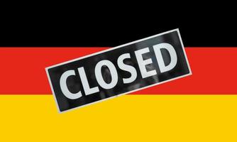 German Flag of Germany with closed sign photo