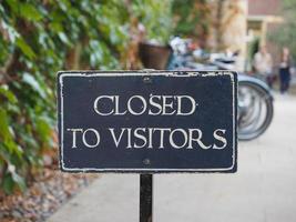 Closed to visitors sign selective focus photo