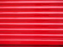 Red corrugated steel metal texture background photo