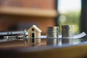 Home loan coins stack on table photo