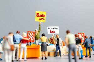 Shoppers with discount tray for shopping discounted items photo