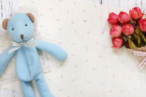 Paper with bear and flowers photo