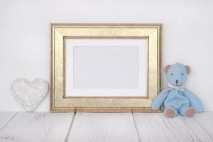 Gold frame with bear and heart photo