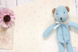 Paper with bear and flower photo