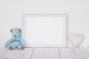 White frame with bear and heart photo