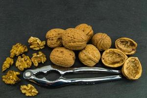 Fresh walnut going to be cracked photo