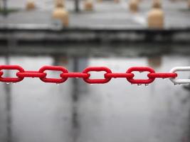 Red plastic chain, selective focus photo