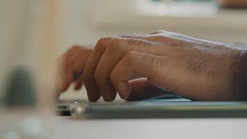 Close up of fingers of man typing on laptop video