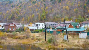 Winter mountain village landscape view in Listvyanka Russia photo