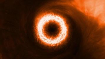 glow orange black  energy black hole with gas cloud nebula in space video
