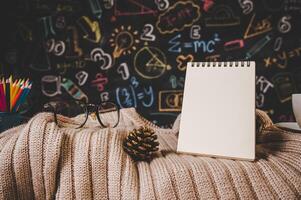 blank notebook in the classroom photo