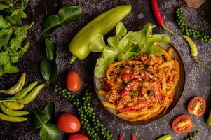 Stir Fried Curry Paste with Bamboo Shoot and Minced Pork. photo