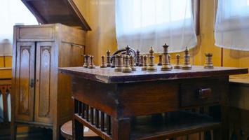 Retro vintage old wooden chess table and tabinet photo