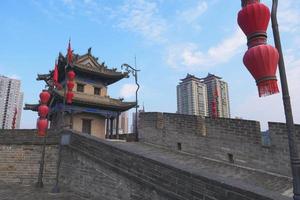 Famous Chinese ancient architecture stone city wall in Xian China photo