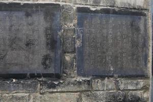 Tabletas de piedra de caligrafía en el bosque de Xian de las estelas de piedra, museo de China foto