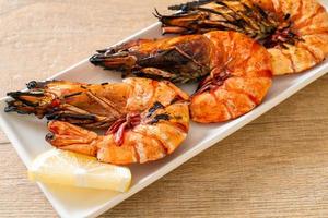 Grilled tiger prawns or shrimps photo