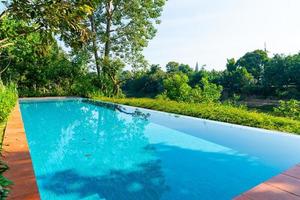 Swimming pool in the garden photo