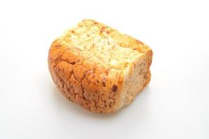 Loaf of bread on white background photo