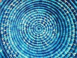 Blue wicker round dish closeup photo