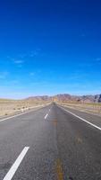 Landscape view of beautiful blue sky and high way road in Gansu Cina photo