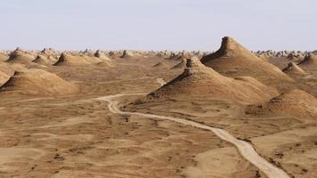 Yardang landform and sunny blue sky in Dunhuang Gansu China photo