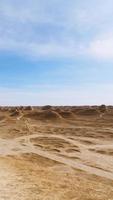 Yardang landform and sunny blue sky in Dunhuang Gansu China photo