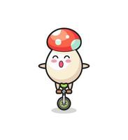 The cute mushroom character is riding a circus bike vector