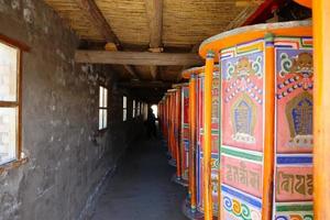 Prayer wheel in Arou Da Temple in Qinghai China. photo