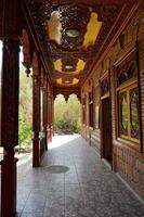 corridor wooden carving of Ba Yi, Turpan Grape Valley Xinjiang photo