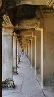 Stone corridor of temple complex Angkor Wat in Siem Reap Cambodia photo