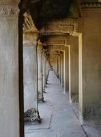 Stone corridor of temple complex Angkor Wat in Siem Reap Cambodia photo