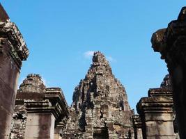 Face tower at the Bayon Temple, Siem Reap Cambodia photo